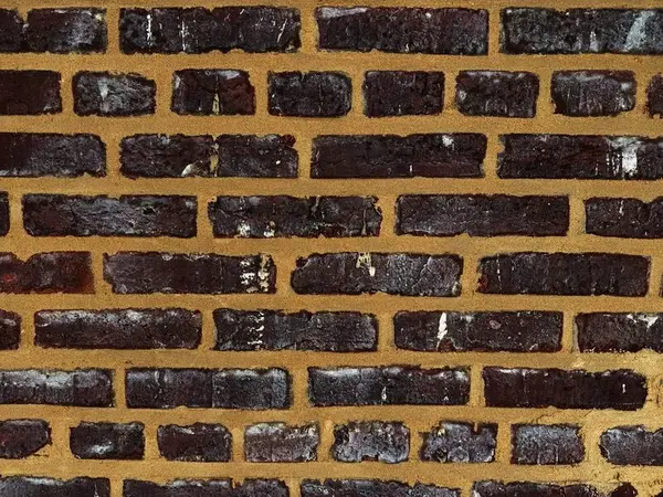 Newly tuckpointed brick wall
