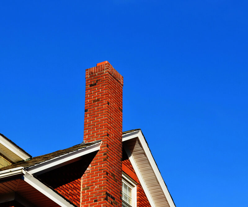 Damaged chimney showing deteriorated mortar joints