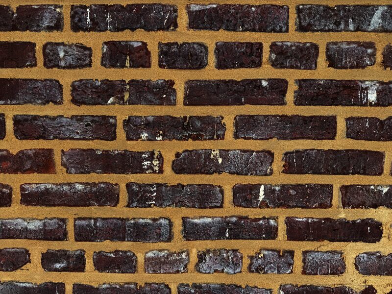 Newly tuckpointed brick wall